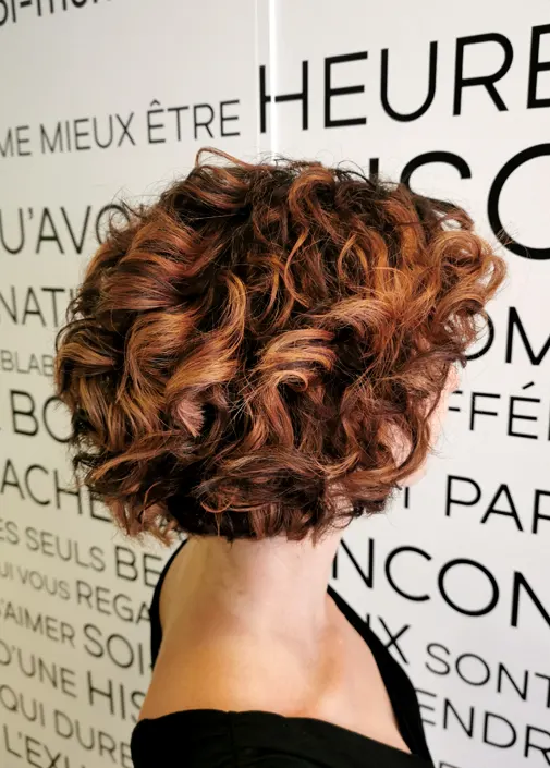 Short curly copper bob