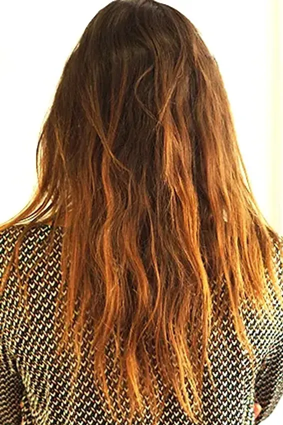 Before: curly, voluminous hair