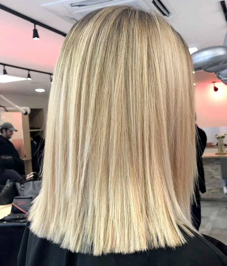 Mid-length blonde bob with highlights