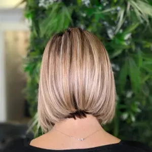 Shiny blonde bob, close-up
